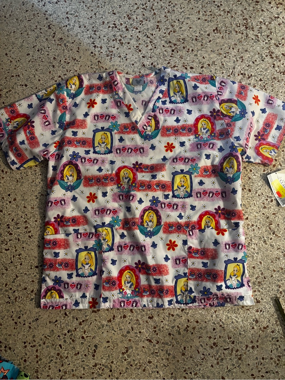 NWT Disney classic Alice in wonderland large scrub top